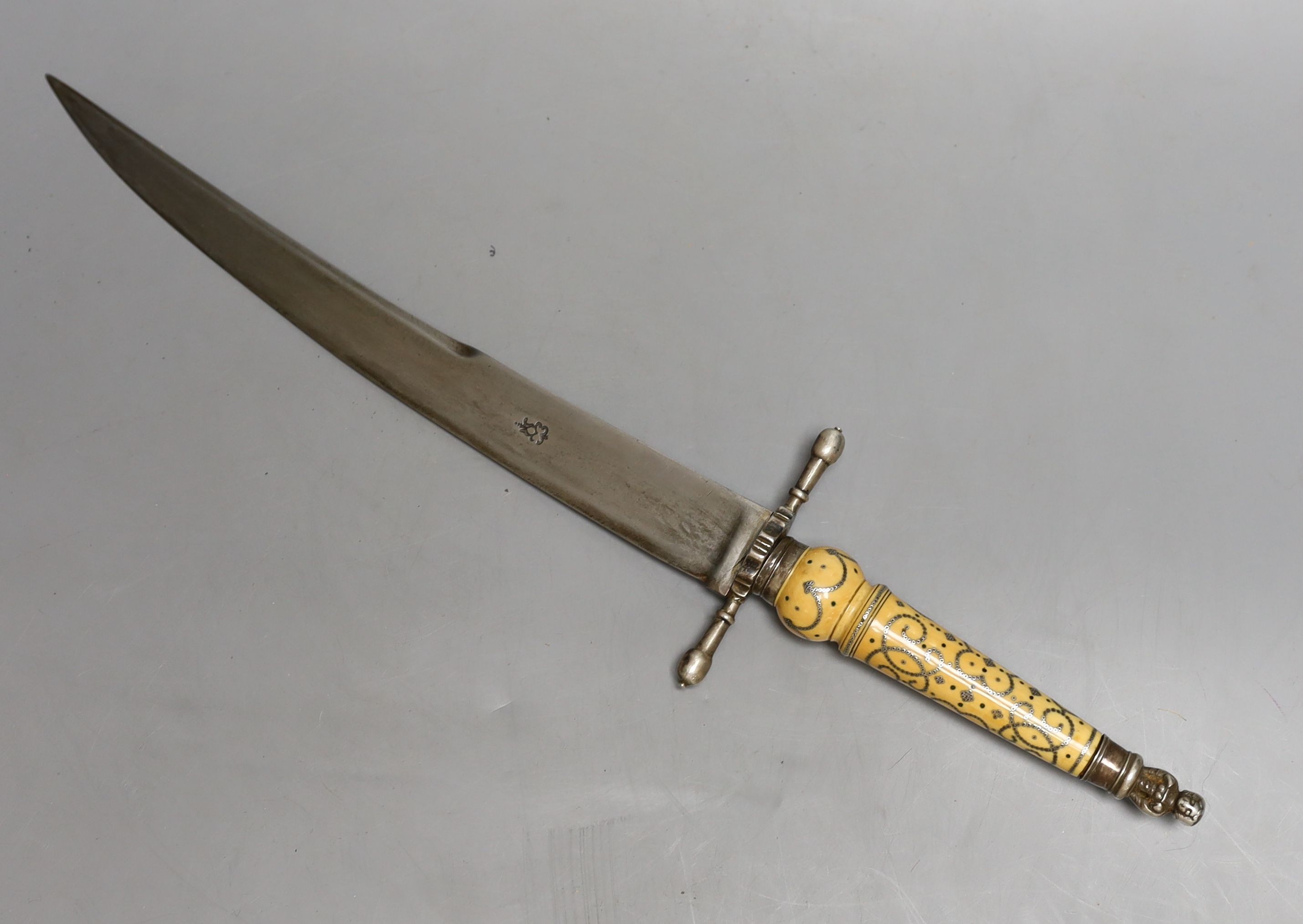 A Fine English Charles II officer’s plug bayonet, blade 30cms struck with maker’s mark, silver mounts including pommel formed as a pair of addorsed angels, turned ivory grip inlaid with green stained ivory pellets and si